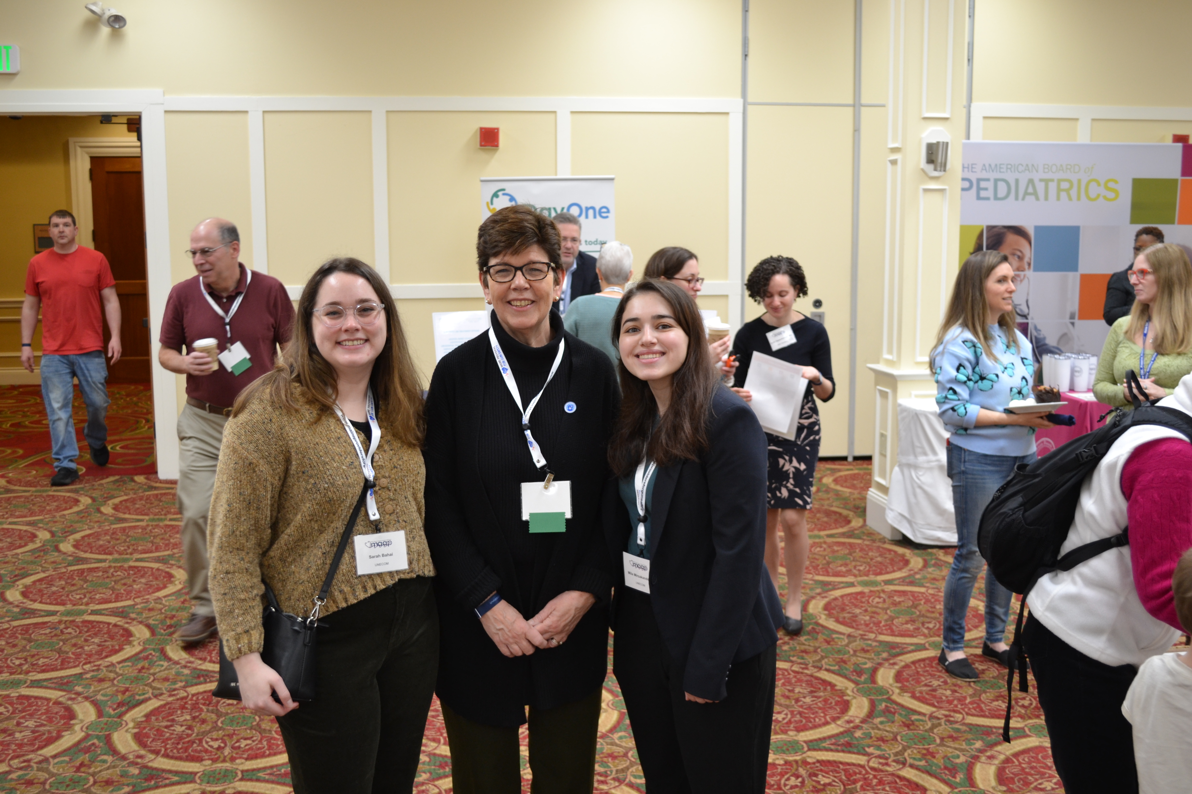 Dr. Carmack with two of the UNE students